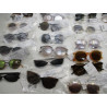65 Paires de lunettes de soleil