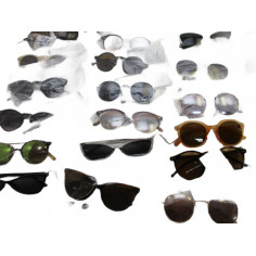 65 Paires de lunettes de soleil