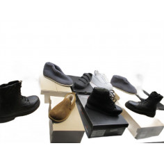 20 Paires de chaussures...